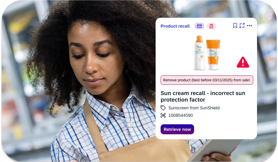 Technician with protective helmet updates test plans via iNFOHUB on the tablet in the workshop
