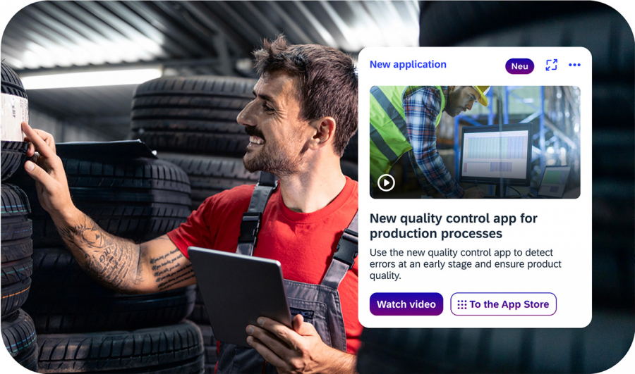 Employee in tire warehouse learns about new quality control app on iNFOHUB